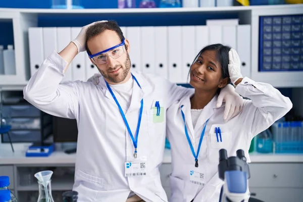 Interracial Couple Working Scientist Laboratory Stressed Frustrated Hand Head Surprised — Fotografia de Stock