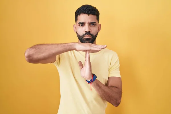 Hispanic Man Beard Standing Yellow Background Doing Time Out Gesture — Stock Photo, Image