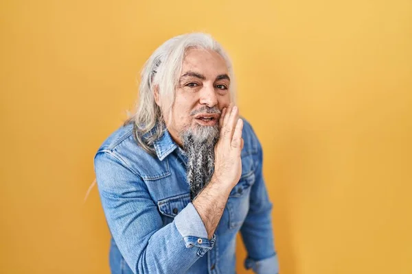 Middle Age Man Grey Hair Standing Yellow Background Hand Mouth — Stock fotografie