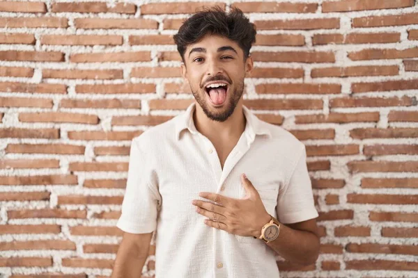 Arab Man Beard Standing Bricks Wall Background Sticking Tongue Out — Stock Fotó