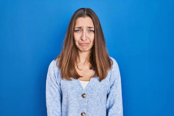 Young Woman Standing Blue Background Depressed Worry Distress Crying Angry — Stockfoto