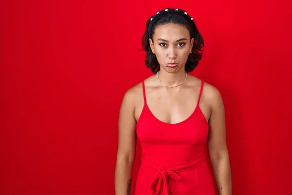 Young Hispanic Woman Standing Red Background Depressed Worry Distress Crying — Stockfoto