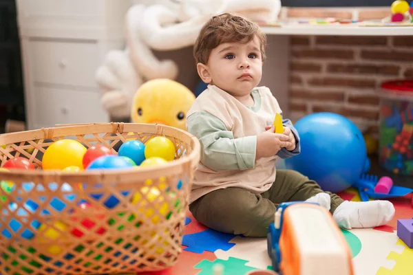 Adorable Hispanic Toddler Playing Balls Sitting Floor Kindergarten — Stock Photo, Image