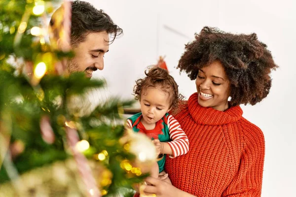Couple Daughter Smiling Confident Decorating Christmas Tree Home — Stock Photo, Image