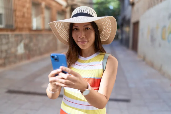 Young Asian Woman Tourist Smiling Confident Using Smartphone Street — ストック写真