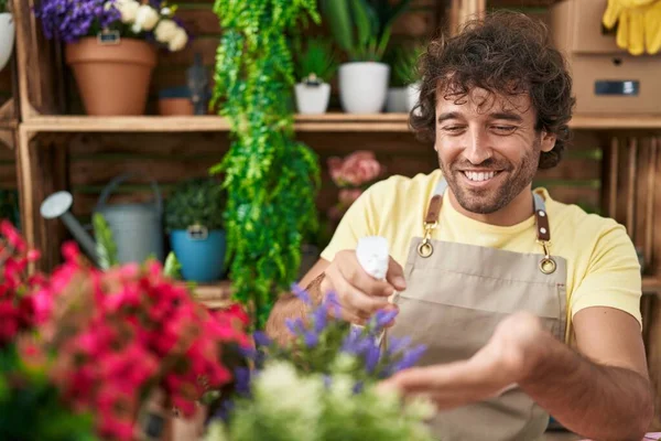 Young Hispanic Man Florist Using Diffuser Watering Plant Flower Shop — Stock Photo, Image