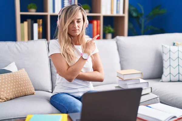 Young Blonde Woman Studying Using Computer Laptop Home Pointing Hand — 图库照片