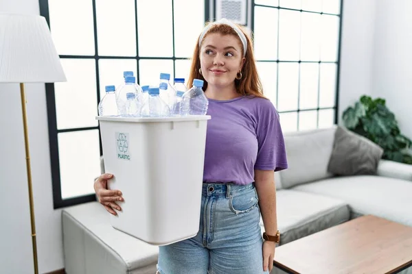 Young Redhead Woman Holding Recycling Wastebasket Plastic Bottles Smiling Looking — Photo