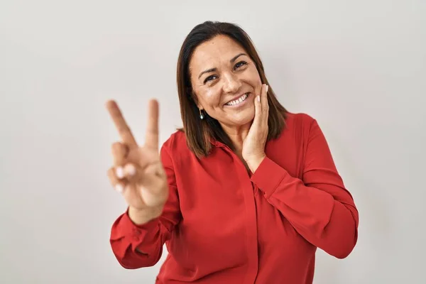 Hispanic Mature Woman Standing White Background Smiling Looking Camera Showing — Foto Stock