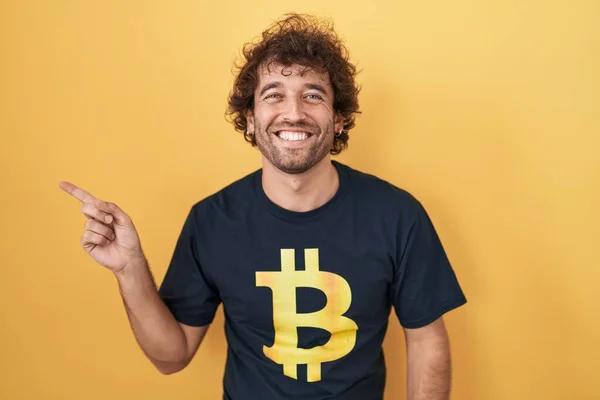Hispanic Young Man Wearing Bitcoin Shirt Cheerful Smile Face Pointing — Foto de Stock
