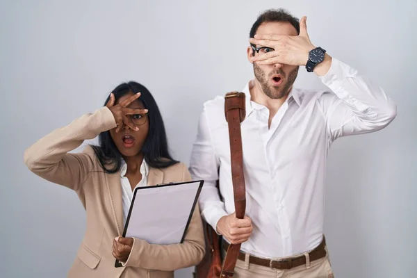 Interracial Business Couple Wearing Glasses Peeking Shock Covering Face Eyes — Foto de Stock