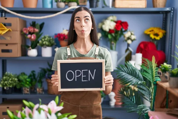 Young Brunette Woman Working Florist Holding Open Sign Making Fish — Stock Photo, Image