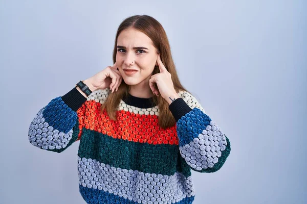 Young Hispanic Girl Standing Blue Background Covering Ears Fingers Annoyed — Photo
