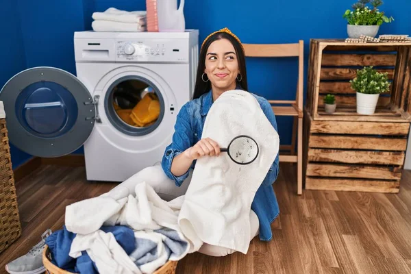 Hispanic Woman Holding Magnifying Glass Looking Stain Clothes Smiling Looking — Stock Photo, Image