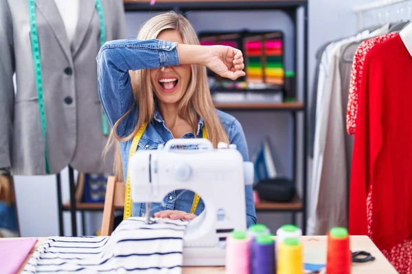 Blonde Woman Dressmaker Designer Using Sew Machine Smiling Cheerful Playing — Stock fotografie