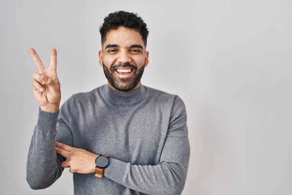 Hispanic Man Beard Standing White Background Smiling Happy Face Winking — Stockfoto
