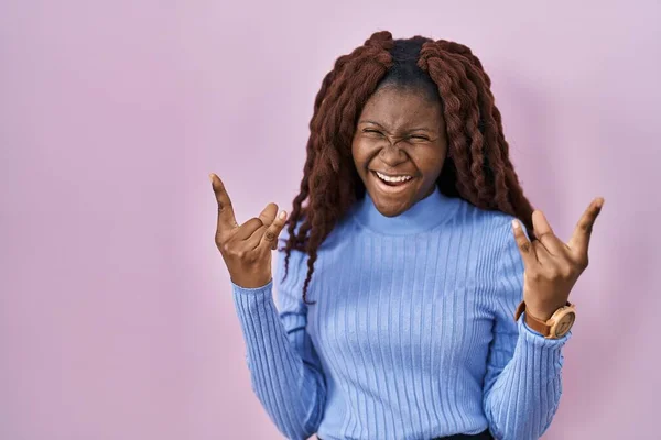 African Woman Standing Pink Background Shouting Crazy Expression Doing Rock — Stockfoto