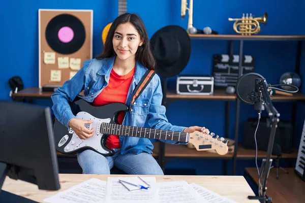 Young Hispanic Girl Artist Playing Electrical Guitar Music Studio — Stock fotografie
