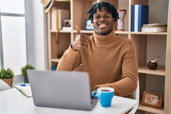 Young African Man Dreadlocks Working Using Computer Laptop Doing Happy — Foto de Stock