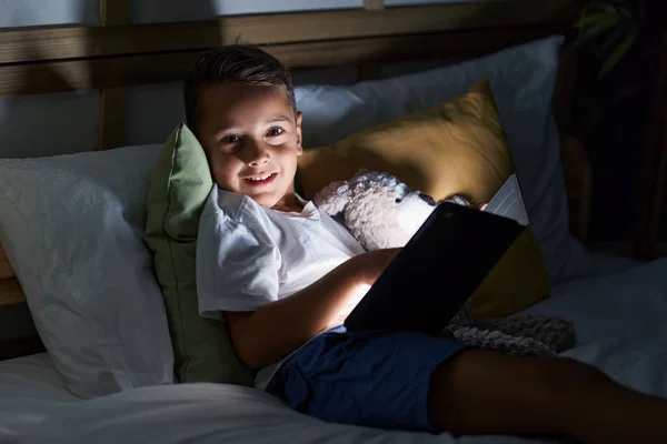 Adorable Hispanic Toddler Using Touchpad Lying Bed Bedroom — Stock Photo, Image