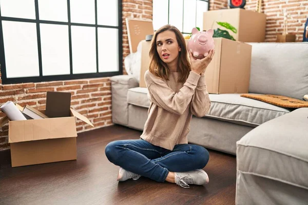 Young Woman Holding Piggy Bank New Home — 图库照片