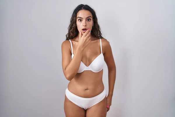 Young Hispanic Woman Wearing White Lingerie Looking Fascinated Disbelief Surprise — Foto de Stock