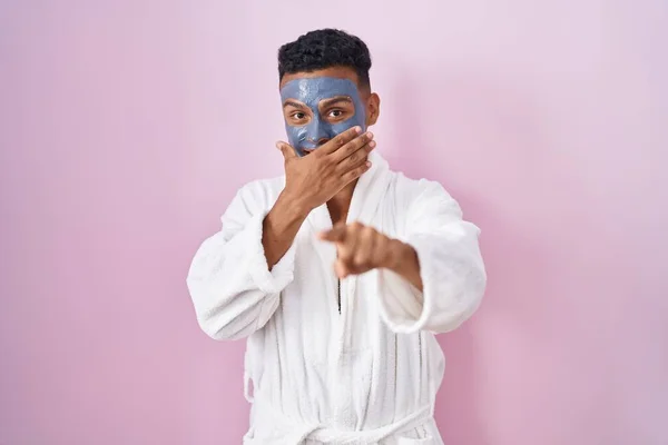Young Hispanic Man Wearing Beauty Face Mask Bath Robe Laughing — Stock Photo, Image