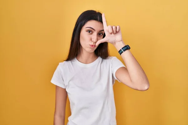 Young Beautiful Woman Standing Yellow Background Making Fun People Fingers — Stock Photo, Image