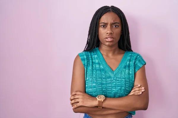 Young African American Braids Standing Pink Background Skeptic Nervous Disapproving — Stockfoto