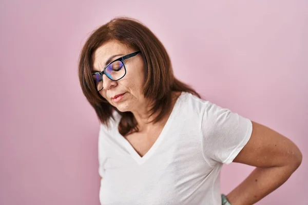 Middle Age Hispanic Woman Standing Pink Background Suffering Backache Touching — Stock Photo, Image