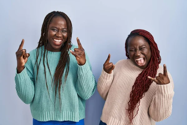 Two African Woman Standing Blue Background Shouting Crazy Expression Doing — ストック写真