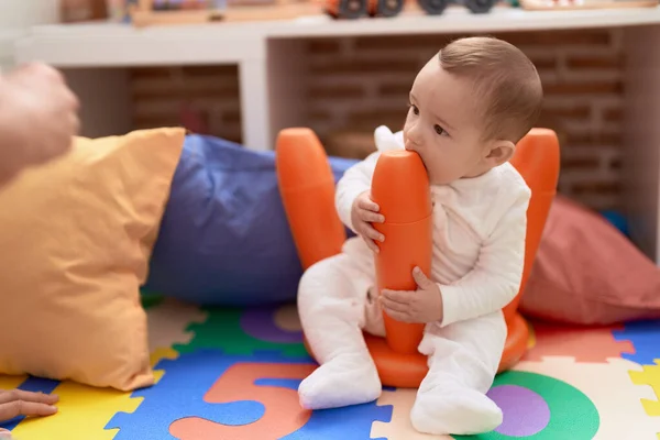 Adorable Toddler Sitting Floor Sucking Chair Kindergarten — Stock Photo, Image