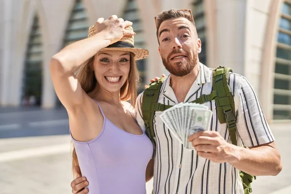 Young Tourist Couple Holding Dollars Banknotes Stressed Frustrated Hand Head — Stock Photo, Image