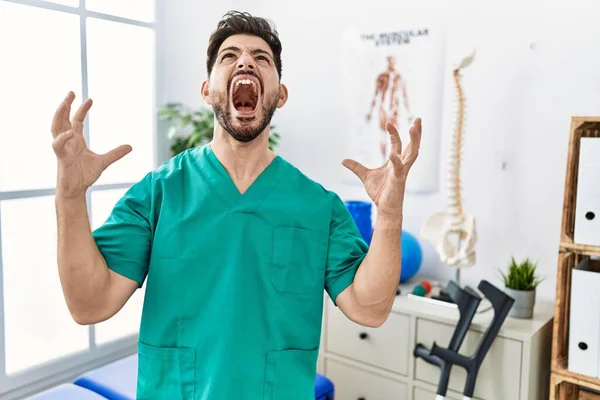 Young Man Beard Working Pain Recovery Clinic Crazy Mad Shouting — Stock Photo, Image