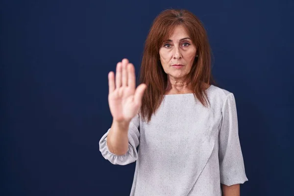 Middle Age Woman Standing Blue Background Doing Stop Sing Palm — Stock fotografie