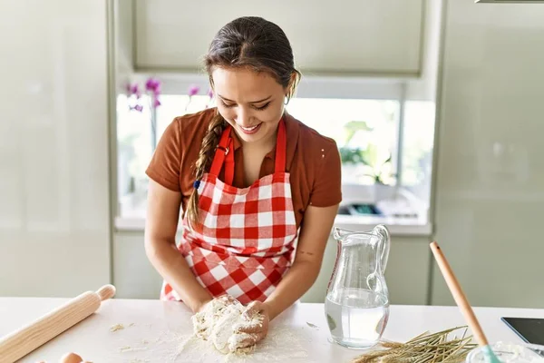 Young Beautiful Hispanic Woman Smiling Confident Kneading Bread Dough Hands — Stock Photo, Image