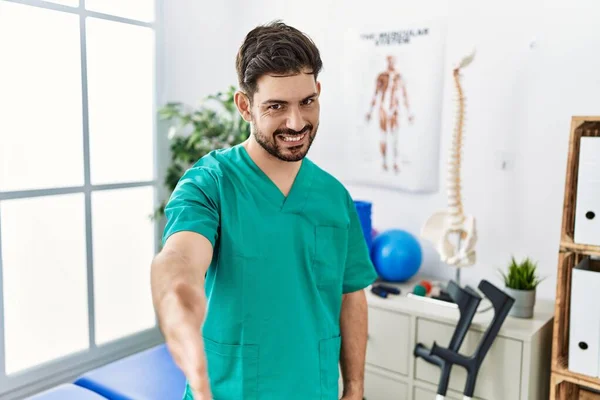 Young Man Beard Working Pain Recovery Clinic Smiling Friendly Offering — Foto de Stock