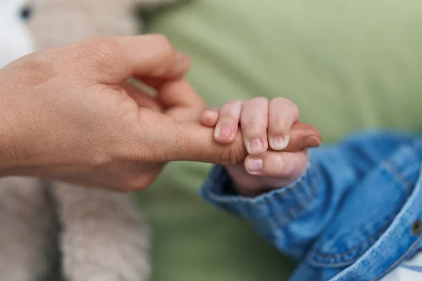 Adorable Caucasian Baby Holding Mother Finger Bedroom — Stock Photo, Image
