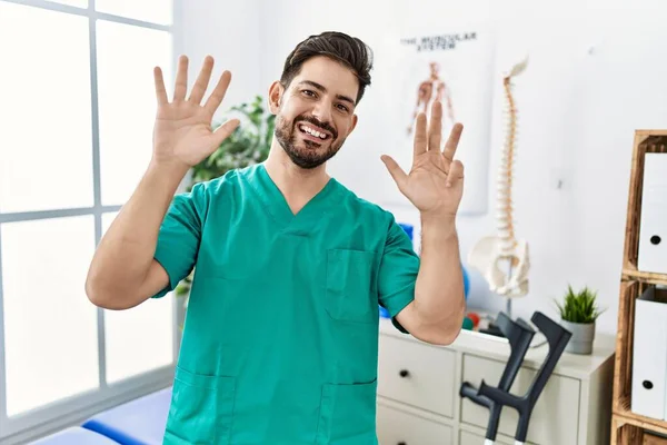 Young Man Beard Working Pain Recovery Clinic Showing Pointing Fingers — Stok fotoğraf