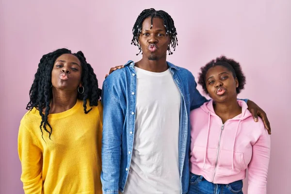 Group Three Young Black People Standing Together Pink Background Looking — Stok fotoğraf