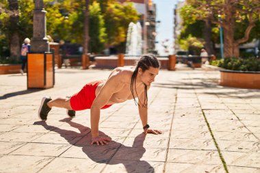 Young man training at park