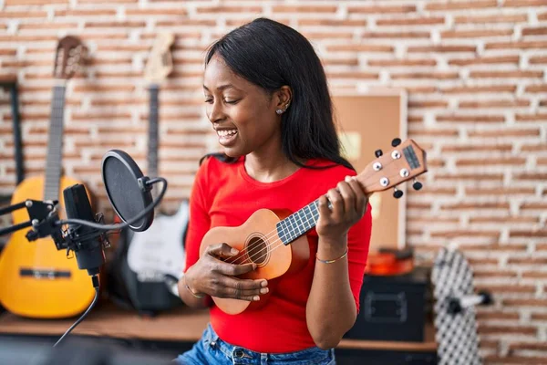 Young African American Woman Musician Playing Ukelele Music Studio — Stock Photo, Image