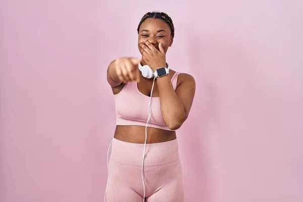 African American Woman Braids Wearing Sportswear Headphones Laughing You Pointing — Foto de Stock