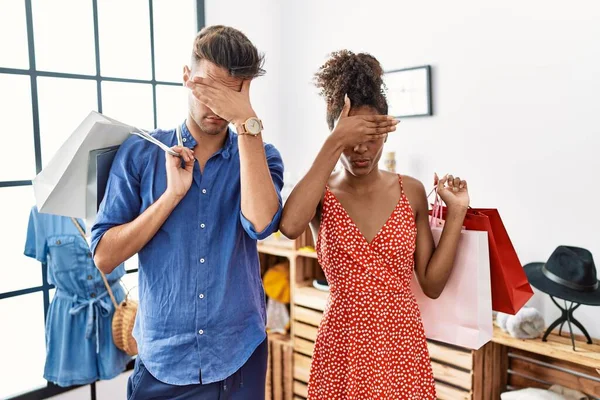 Young Interracial Couple Holding Shopping Bags Retail Shop Covering Eyes — Stock Photo, Image