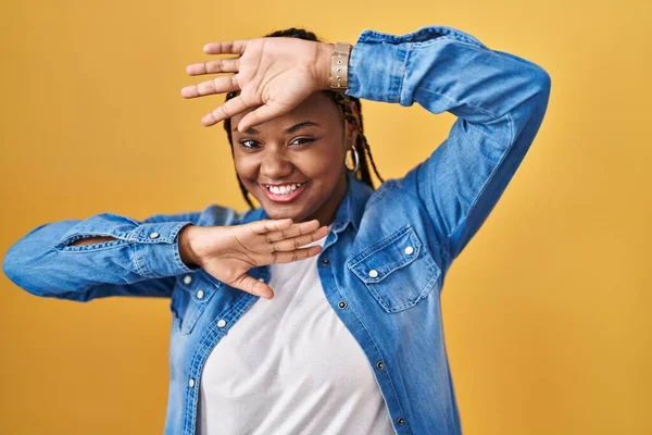 African American Woman Braids Standing Yellow Background Smiling Cheerful Playing — Stockfoto