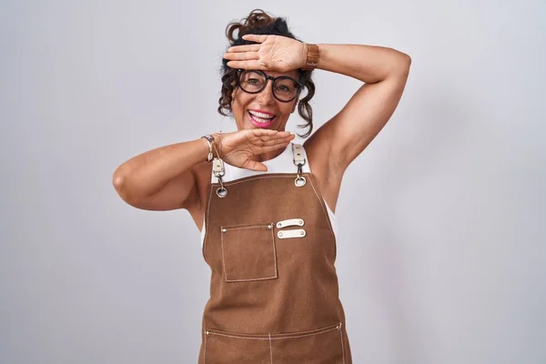 Middle Age Woman Wearing Apron White Background Smiling Cheerful Playing — 스톡 사진