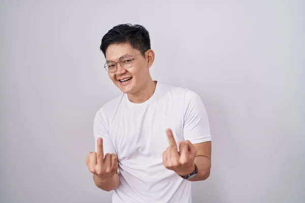 Young Asian Man Standing White Background Showing Middle Finger Doing — Photo