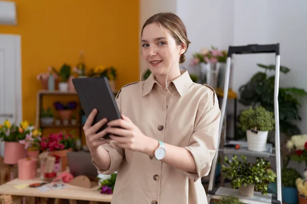 Young Caucasian Woman Florist Smiling Confident Using Touchpad Flower Shop — Stockfoto