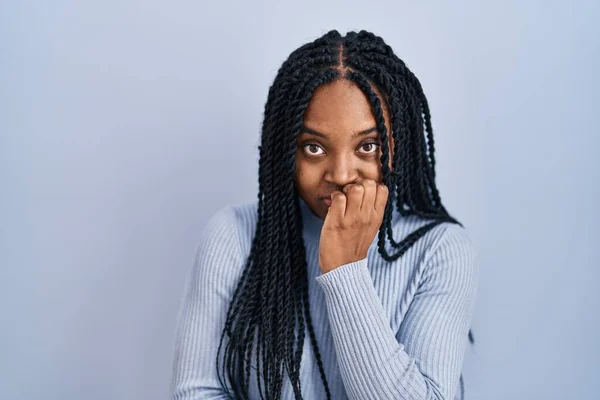 African American Woman Standing Blue Background Looking Stressed Nervous Hands — Stockfoto