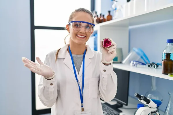 Young Woman Working Scientist Laboratory Holding Geode Celebrating Achievement Happy — Stock Photo, Image